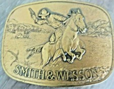 original SMITH WESSON BRASS 1975 GUN MFG CO BELT BUCKLE MAN ON HORSE SHOOTING