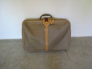 gucci travel luggage