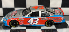 RICHARD PETTY 43 VICTORY LAP 2003 1/24 NASCAR AUTOGRAPHED CLEAR WINDOW BANK CAR