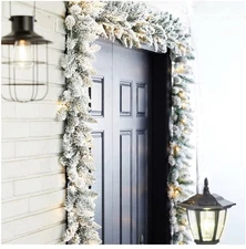 Glitzhome 2PK 9ft Pre-Lit Snow Flocked Christmas Garland Warm White LED w/ Timer