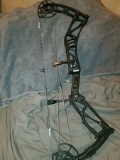 Elite Enkore RH, No Reserve, 70Lb Adjustable draw. Black/Carbon