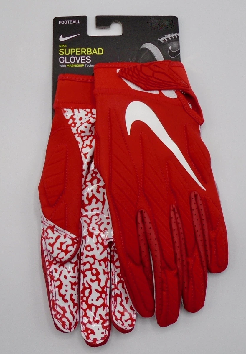 Red and white nike top football gloves