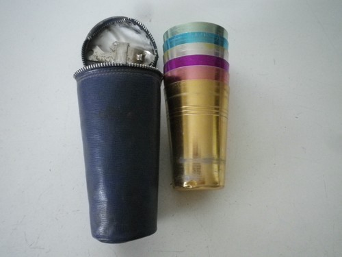 6 ALUMINIUM BEAKERS AND BOTTLE OPENER IN A CASE