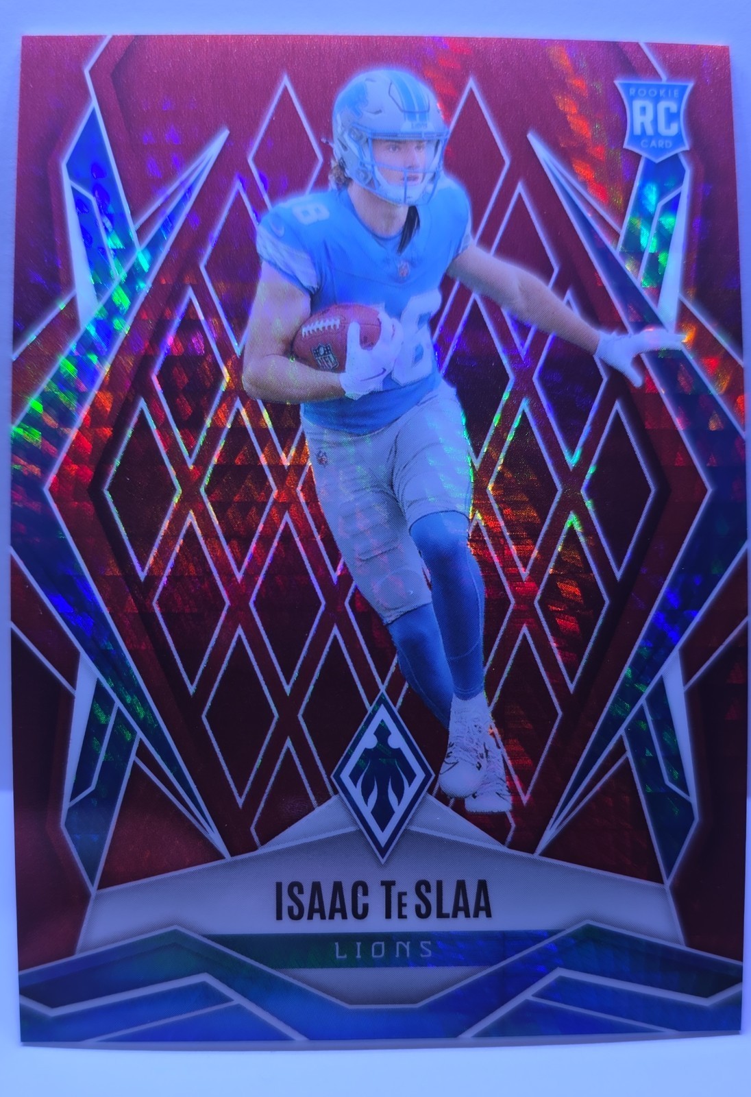 2025 Panini Phoenix - Rookies Isaac Teslaa #189 Red Hyper /399 (RC)