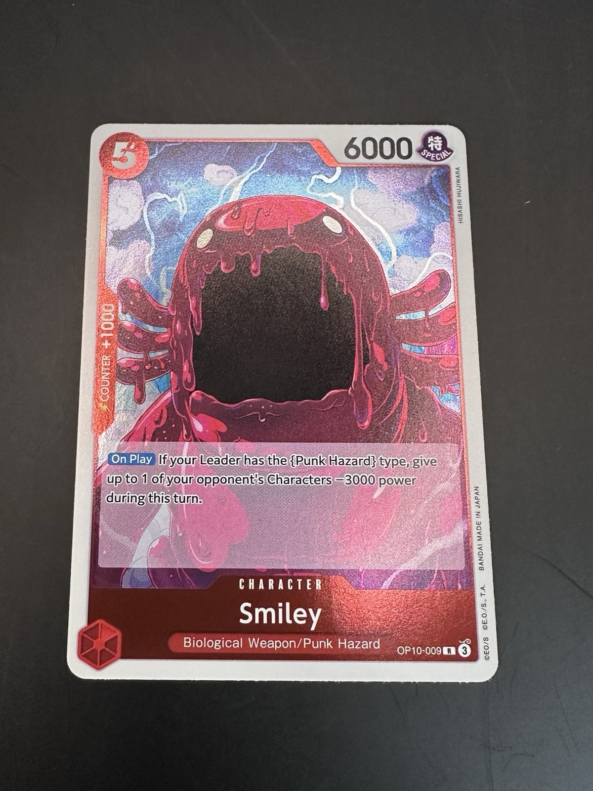 TARJETA COMERCIAL One Piece OP10-009 Smiley rara