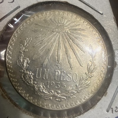 1935 un peso M AU  Key Date 8.05 Mil Minted Beutiful Toning