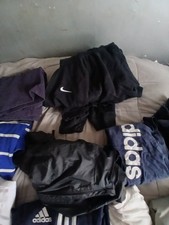 Bundle Of Clothes Of Diffrent Brands And Sizes