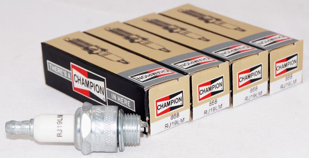 Set of 4 Champion Copper Plus 868 Spark Plugs RJ19LM