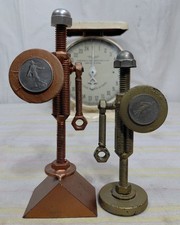 Scrap Metal Sculptures Set of 2 Knights W/ Shields Made Of Silver French Franc's