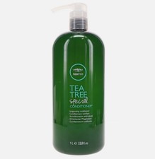Paul Mitchell Tea Tree Special Conditioner 33.8 oz with Pump has dents/markings