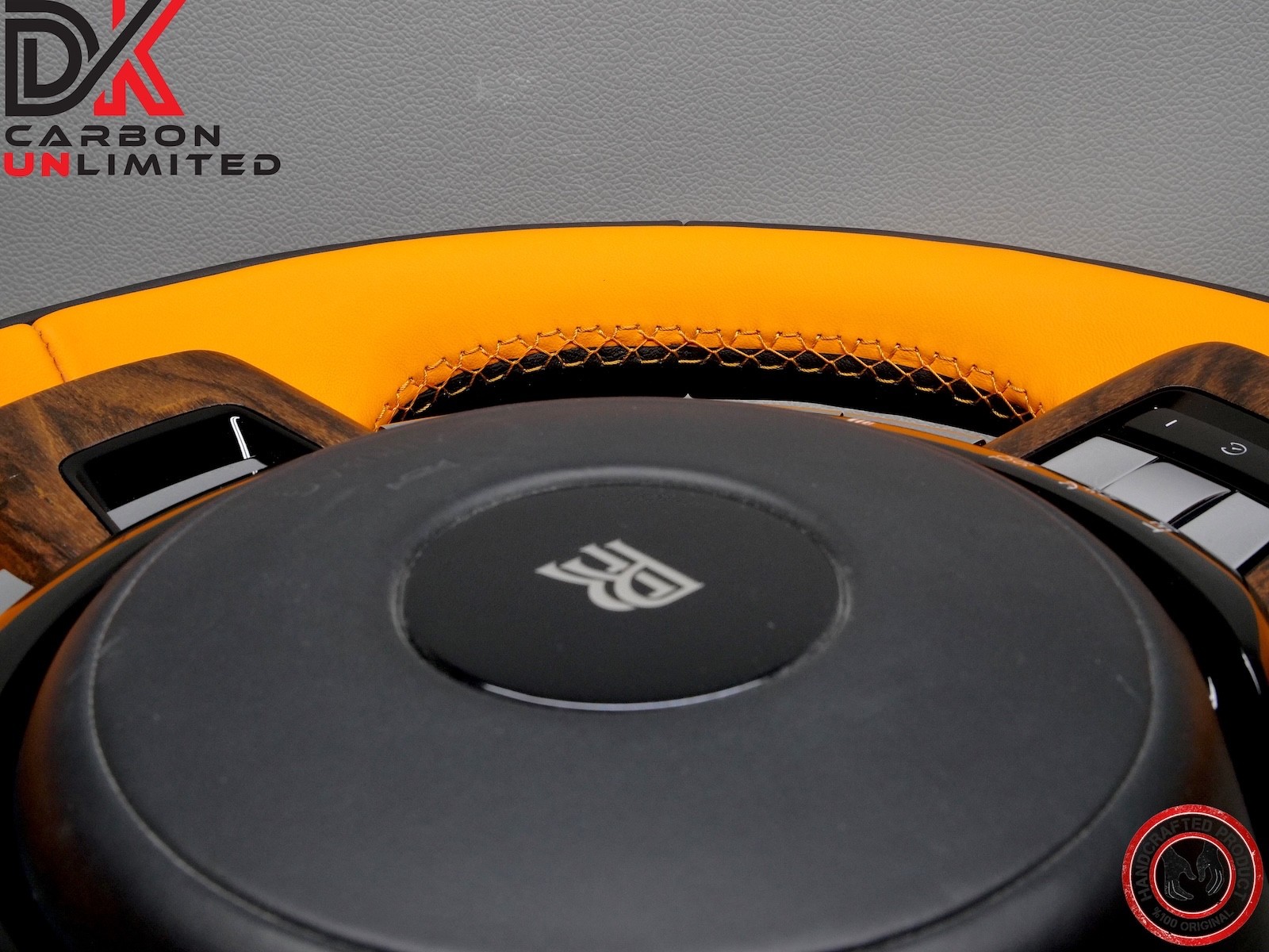 Rolls Royce Spectre Thick Rimmed Two Tone Black & Mandarin Stitch Steering Wheel