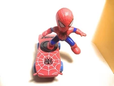 Spider-Man figure on a skateboard, striking design, functional for children.