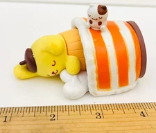 Sanrio sleeping Pompompurin with cat figure