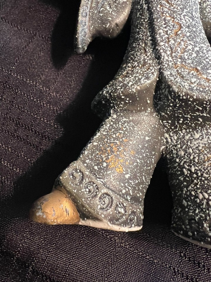 Asian boy figurine gold paint accents rough texture glossy hair & face