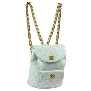 chanel quilted drawstring bag
