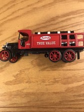 ERTL Die Cast 1925 Kenworth True Value Hardware Stake Truck Bank w Barrels