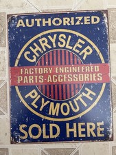 Authorized Chrysler Plymouth sold Here tin sign made in usa. 13 x 16
