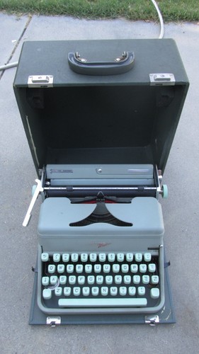 Vtg. Hermes media seafoam green portable typewriter w/ case working