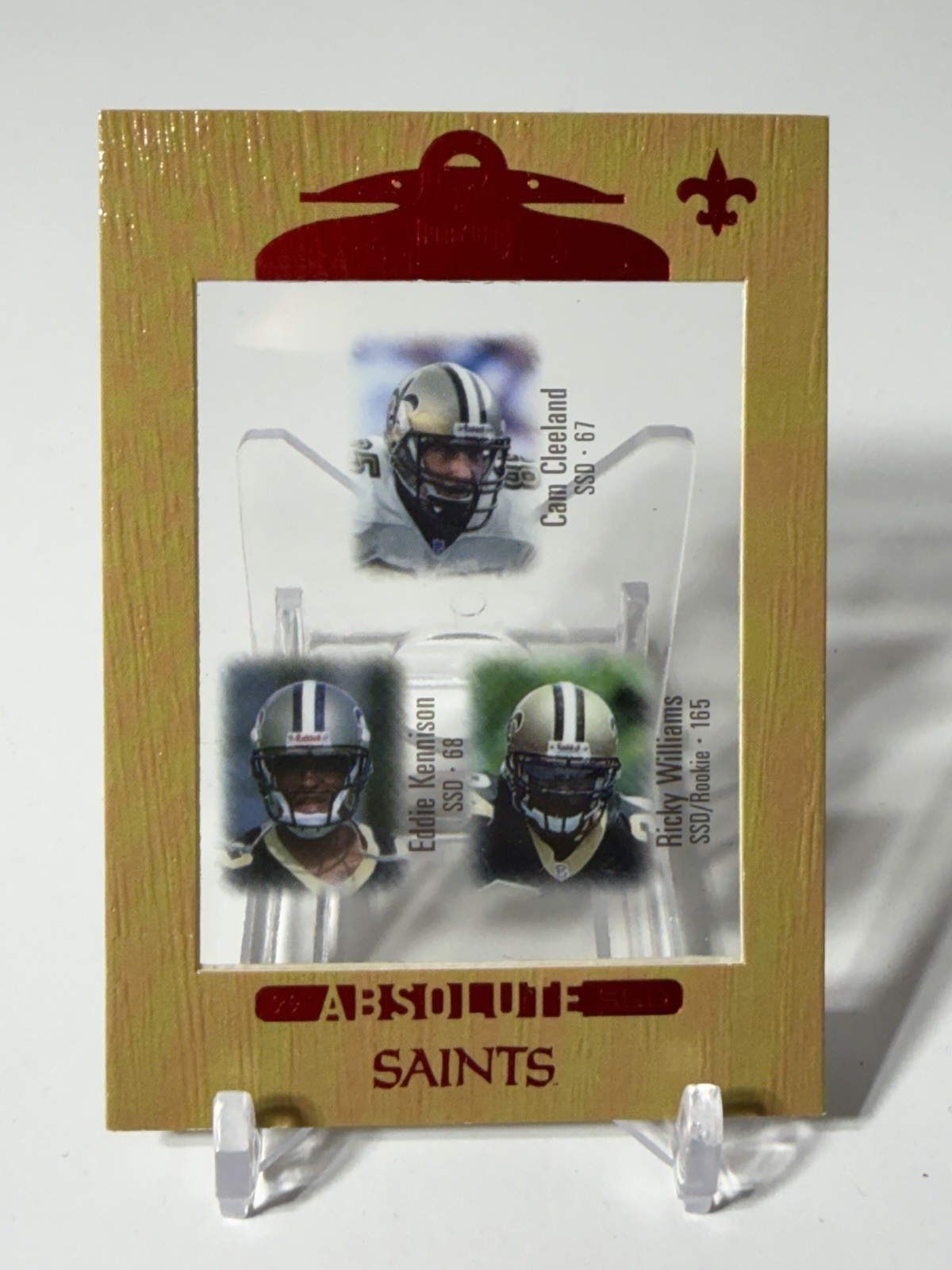 1999 Playoff Absolute SSD - Ricky Williams, Eddie Kennison, Cam Cleeland #148 RC