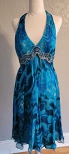 Blue Patterned Halter Dress with Silver Accents Perfect for Any Occasion