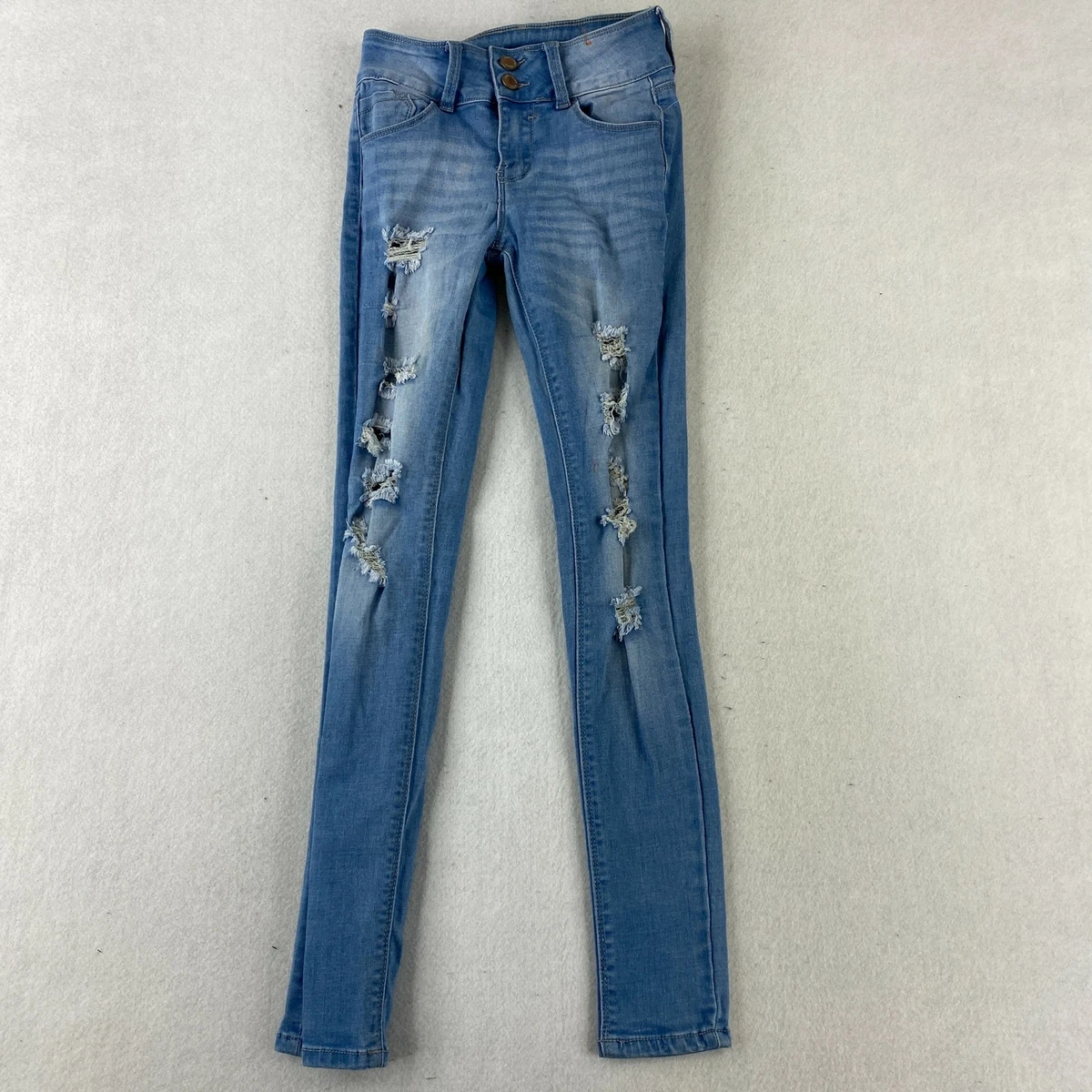 Ankle torn jeans sales
