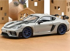 Porsche 718 Cayman GT4 RS Weissach Package Chalk White in 1:18 scale by Norev