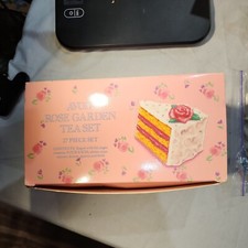 Avon vintage rose garden tea set for little girls. Slightly Used GREAT SHAPE 
