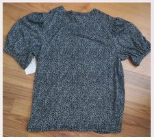 Black w white lil flowers size Med Lauren Conrad puff top Polyester/Spandex 21"