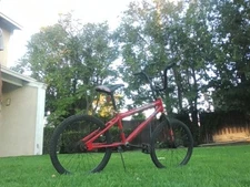 Used Bike With Suspension Brakes , Vivid Red. Good Condition.