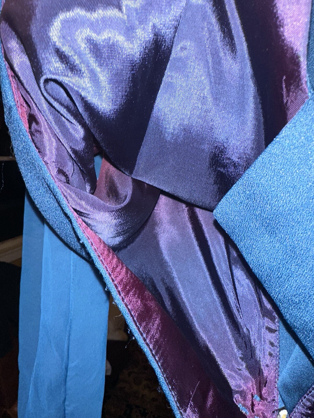 Blue and purple satin-lined vintage J.R. Nites coat, size 12, with pink inner lining visible through the blue outer layer.