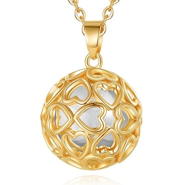 Collier bola de grossesse apaisant boule blanche et cage coeurs pour le bien-être de bébé