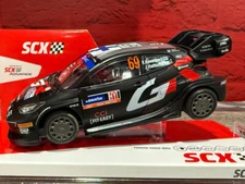 SCX 1/32 Scale ANALOG 4x4 Toyota Yaris WRC - Rally Swede with lights U10529X300