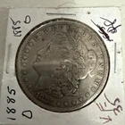1885-O Morgan Silver Dollar In VF Condition