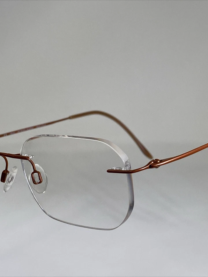 Marco de gafas CHARMANT CH8600 titanio naranja sin montura 19-140 mm  Foto 4 de 4