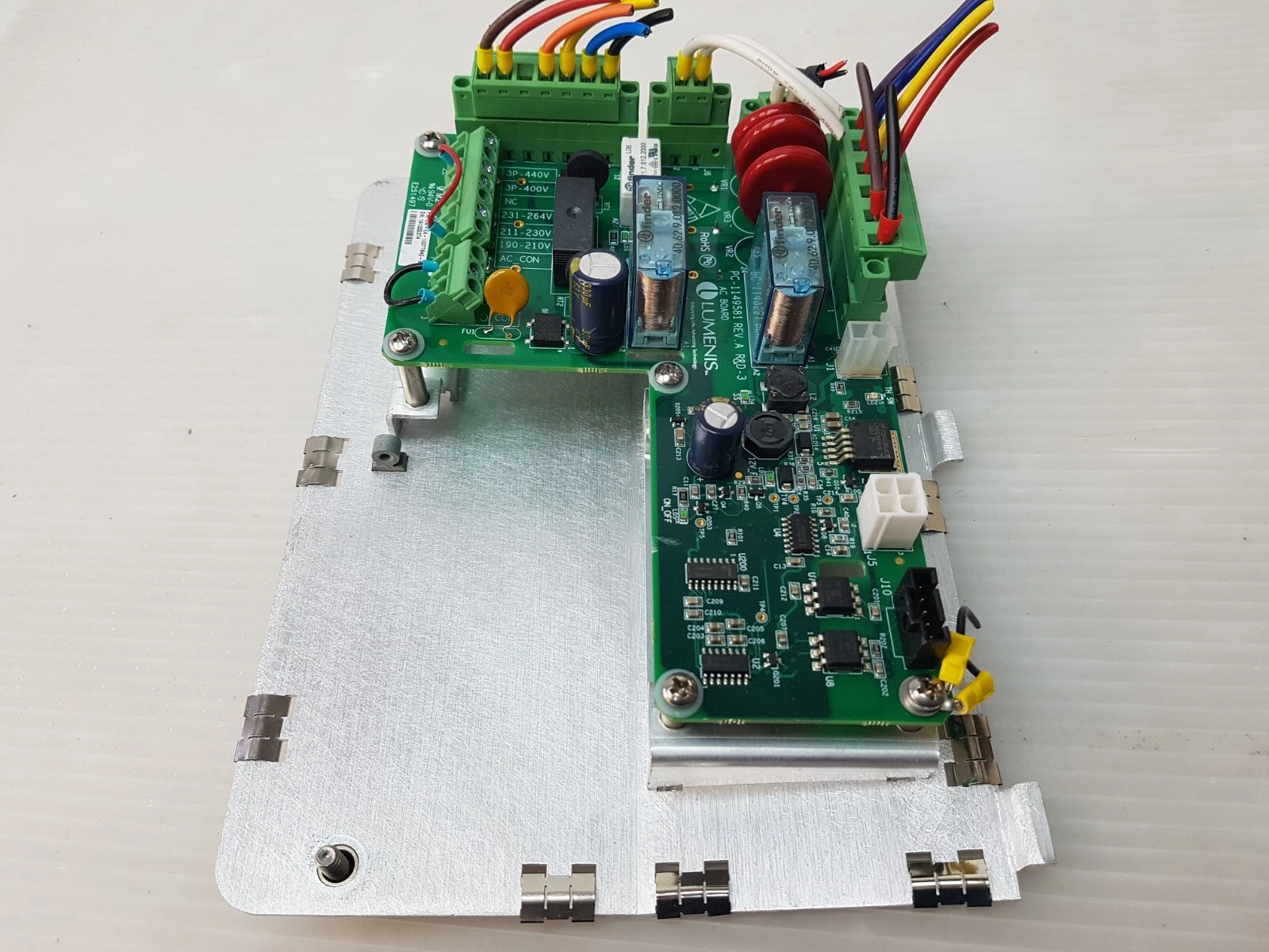 Lumenis AC board assembly rotated, showing the J8 voltage-selection terminal block