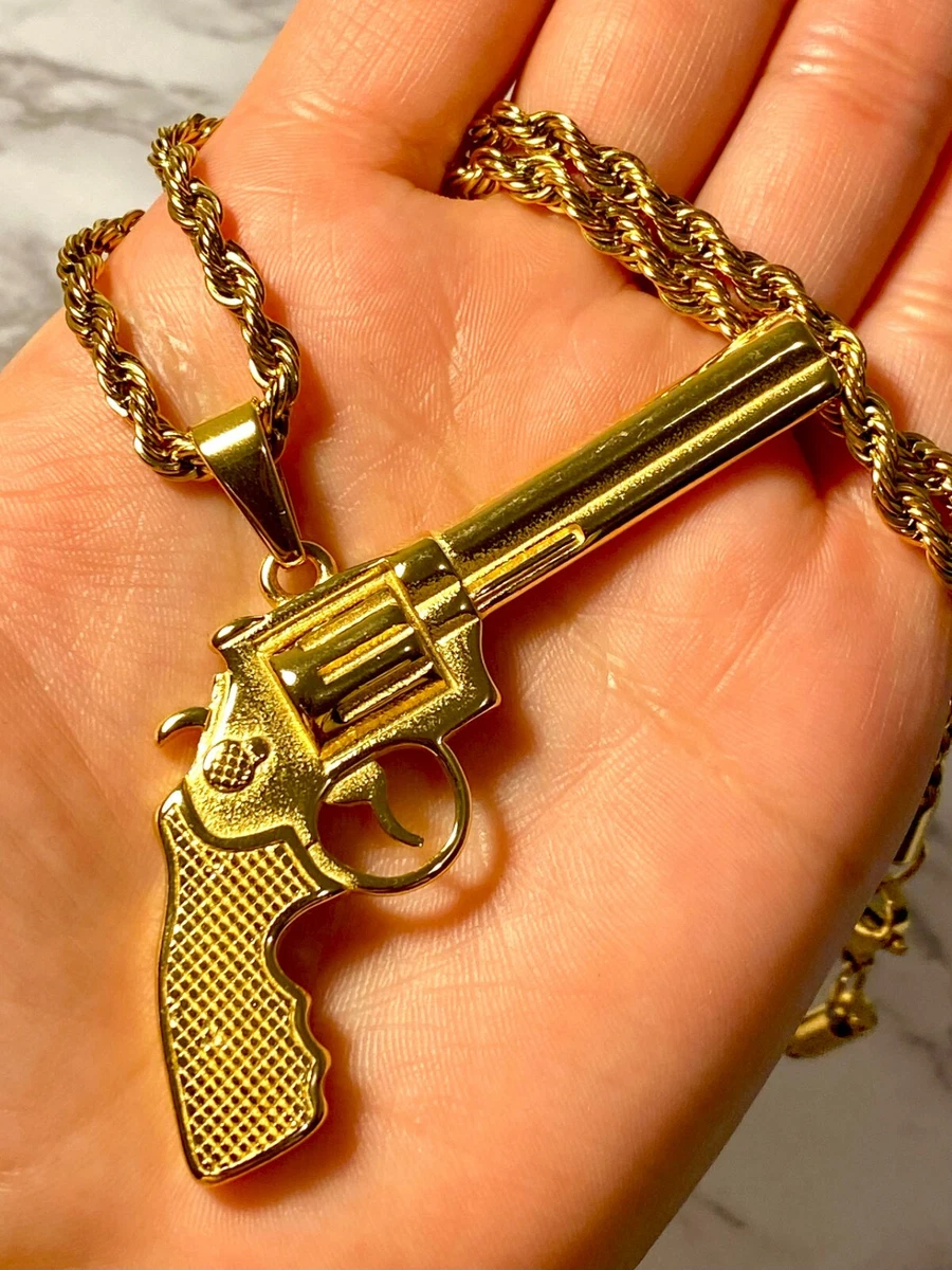 Solid gold gun pendant sale