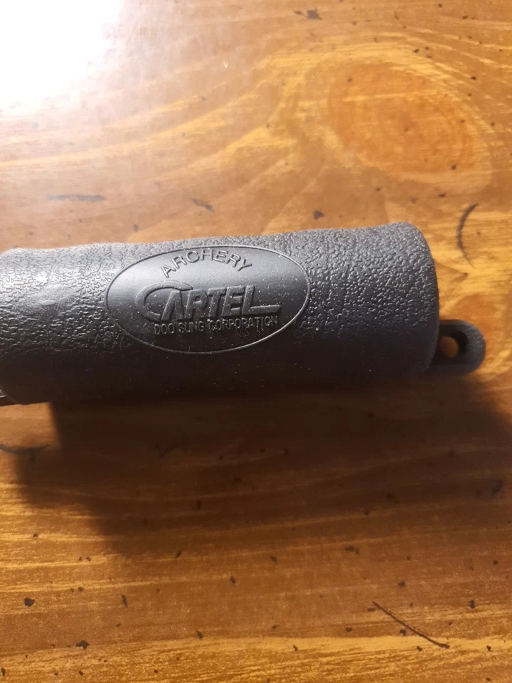 Extractor de flechas de goma Cartel Foto 3 de 3