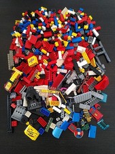 Lego Konvolut mit Bausteine Dachsteine Fenster Figuren Räder Spezial mehrfarbig