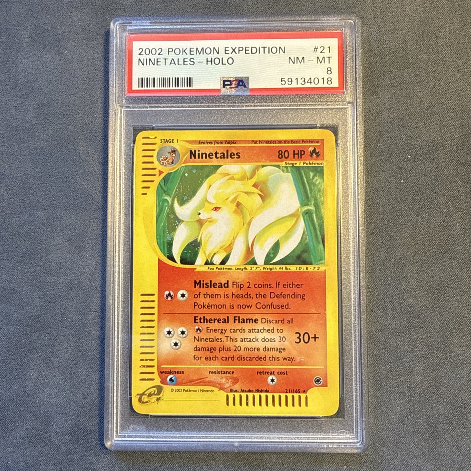 2002 POKEMON EXPEDITION #21 NINETALES-HOLO PSA 8