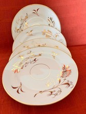 Set of 4 modern unbranded small bone china side plates. Free postage UK buyers.