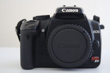 Canon EOS Rebel XTi 10.1MP Digital SLR Camera Body, with 1 full charge battery.