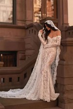 Elegant Backless Mermaid Wedding Dress with Floral Long Sleeved Lace Bridal Gown