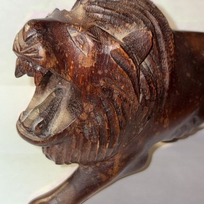 vintage hand carved  lion roaring showing teeth, very light wood. late 60's-70's