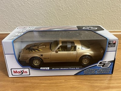PONTIAC FIREBIRD TRANS AM GOLD 1/18 DIECAST MODEL CAR BY MAISTO