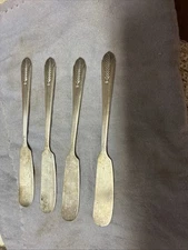 Vintage silver-plated butter knives by Wm. Rogers Mfg. Co./Intern. Silver Co.