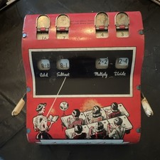 Wolverine Arithmetic (Mathematics) Quiz Mechanical Tin Toy. Made in USA