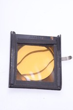   RHACO ANTIQUE GLASS DROP-IN ORANGE FILTER HOLDER FITS 34-36MM LENS FRONT