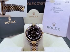 2006 Rolex GMT Master II 16713 40mm Black Dial 18k Gold Steel Jubilee Box Papers