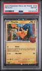 PIKACHU #018 COSMOS HOLO PUMPKIN STAMPED 2024 POKEMON TRICK OR TRADE PSA 8