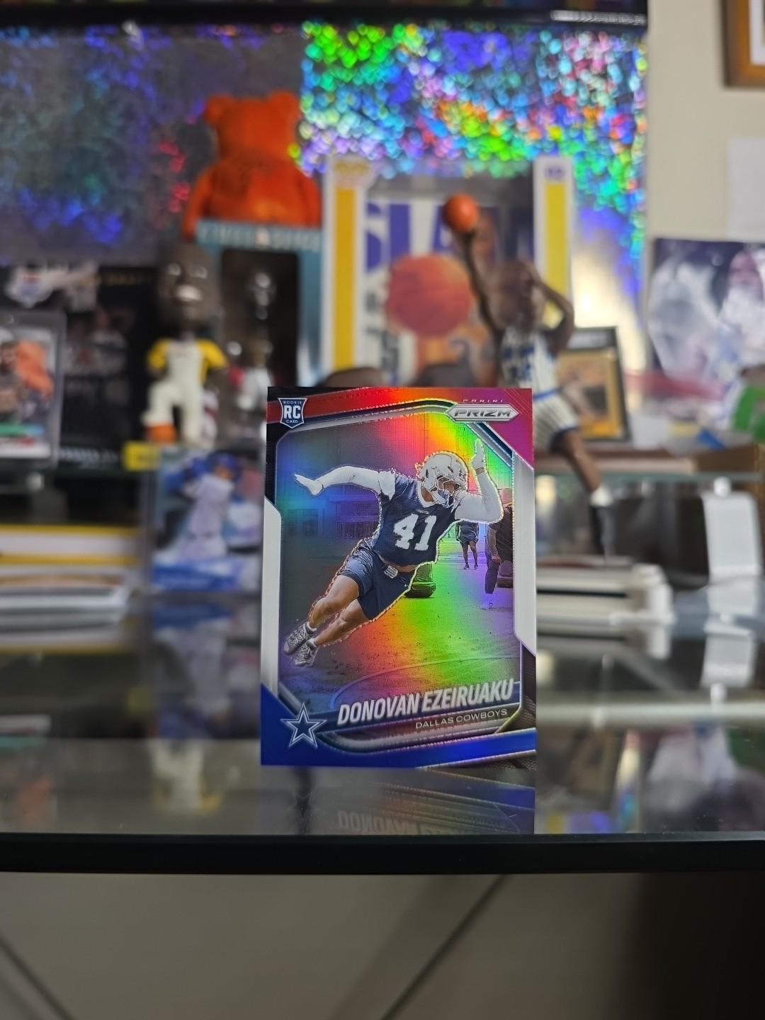 2025 Panini Prizm Donovan Ezeiruaku (RC) Red, White, & Blue Prizm #314
